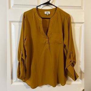 Mustard colored blouse
